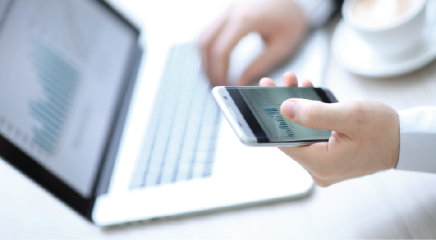 Man checking phone and working